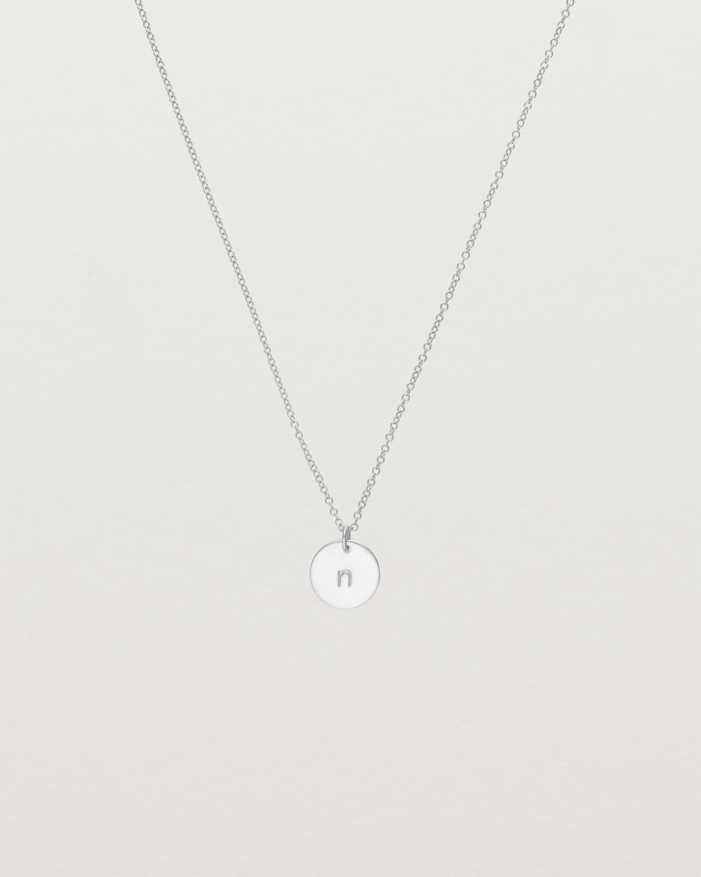 Silver necklace deals with initial discs