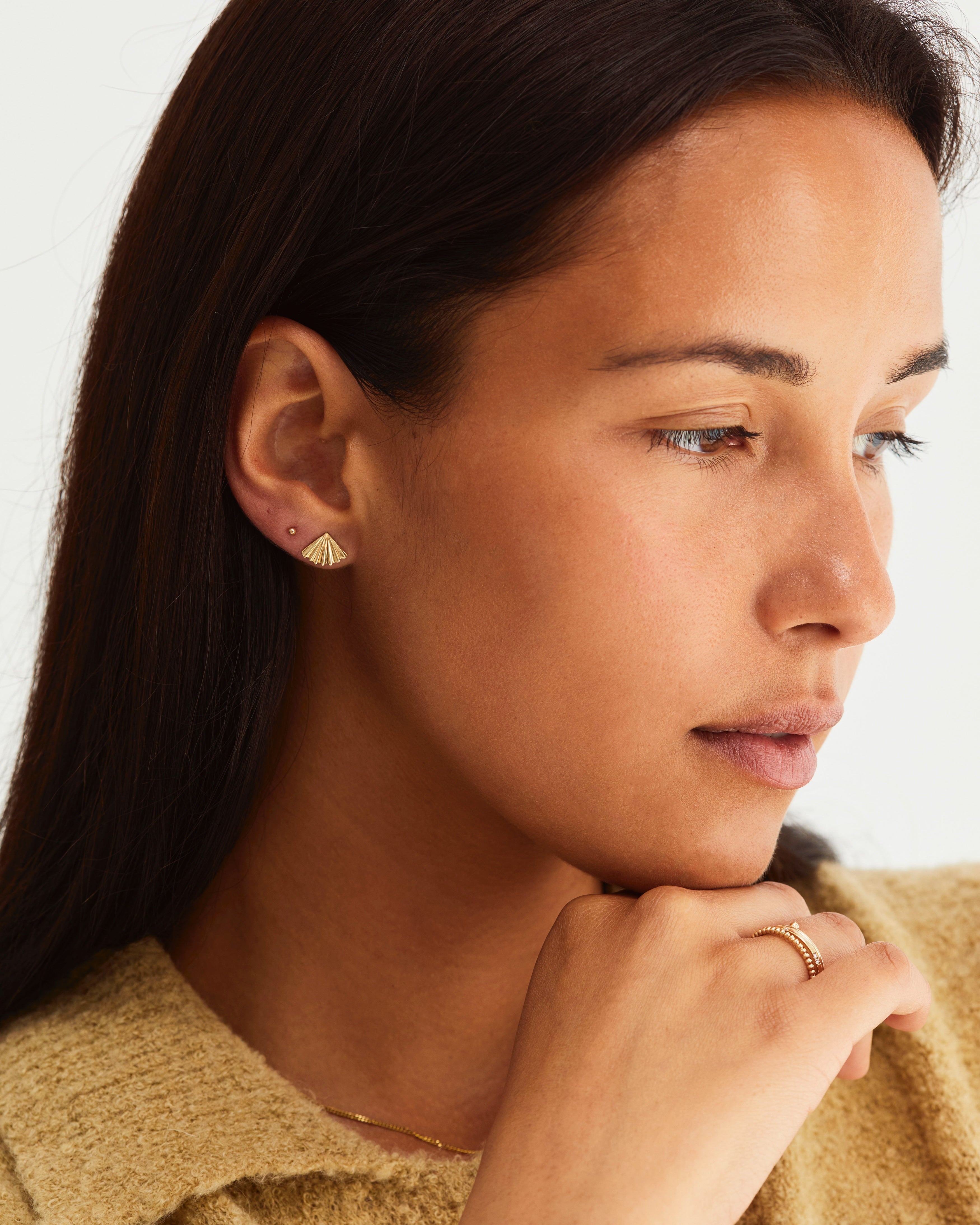 Tiny dot store stud earrings