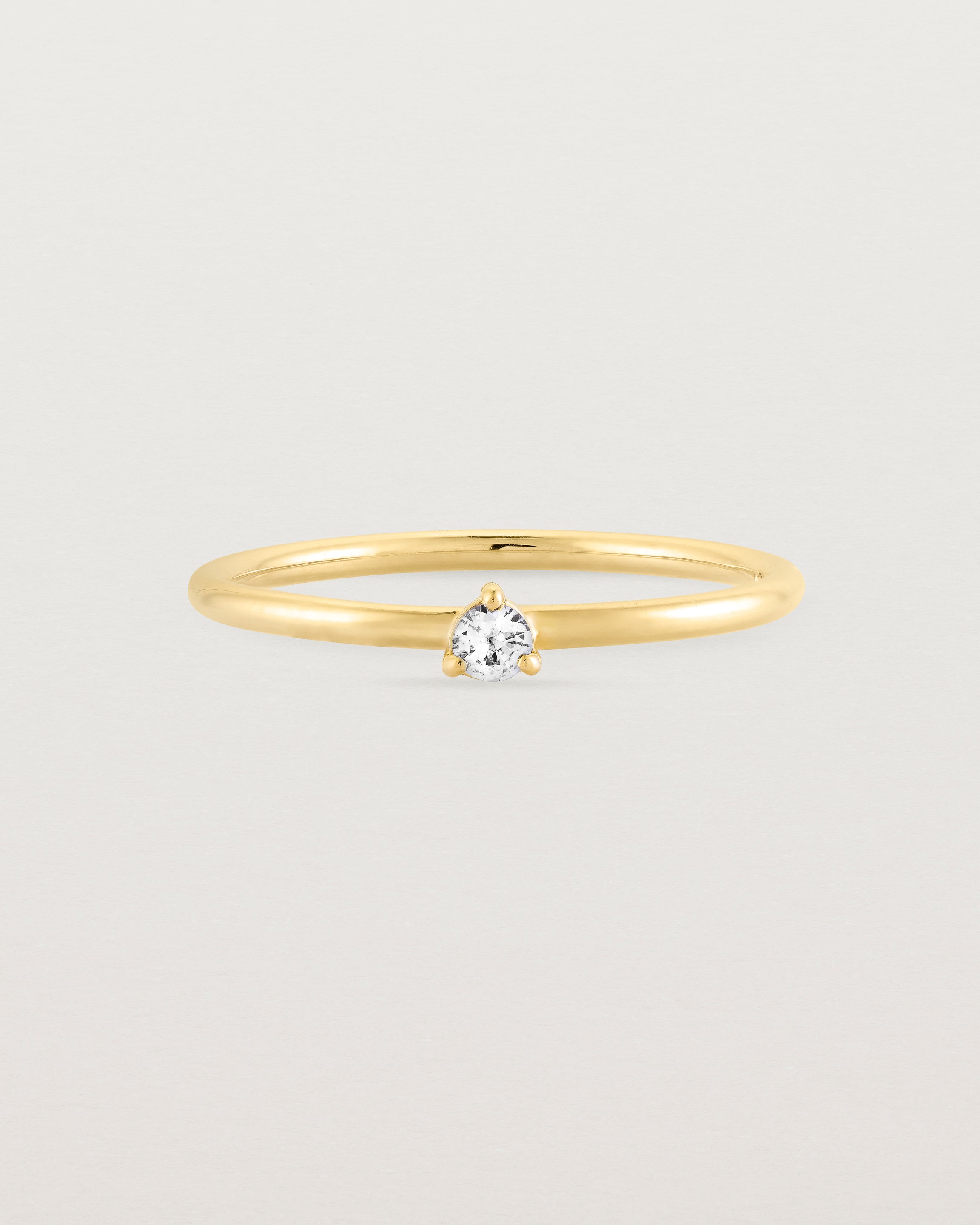 Single solitaire white diamond ring in yellow gold