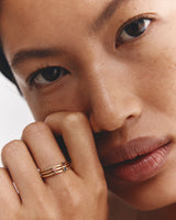 Model wears Ruby, Pink Tourmaline and Sapphire Aisha Stacking Ring.