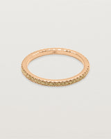 rose gold band featuring micro pave champagne diamonds