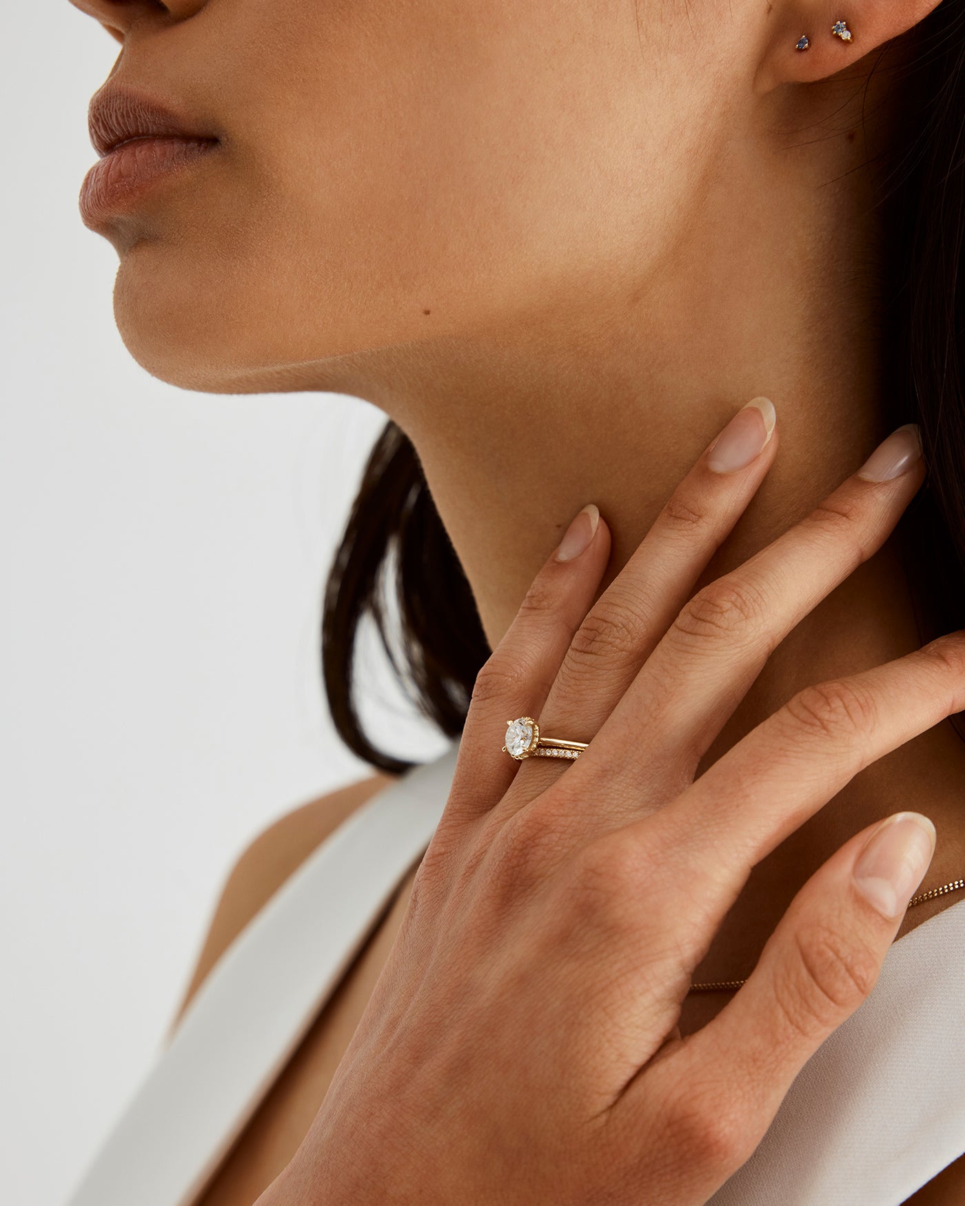 A woman wearing the Annie Ring in Champagne Diamonds