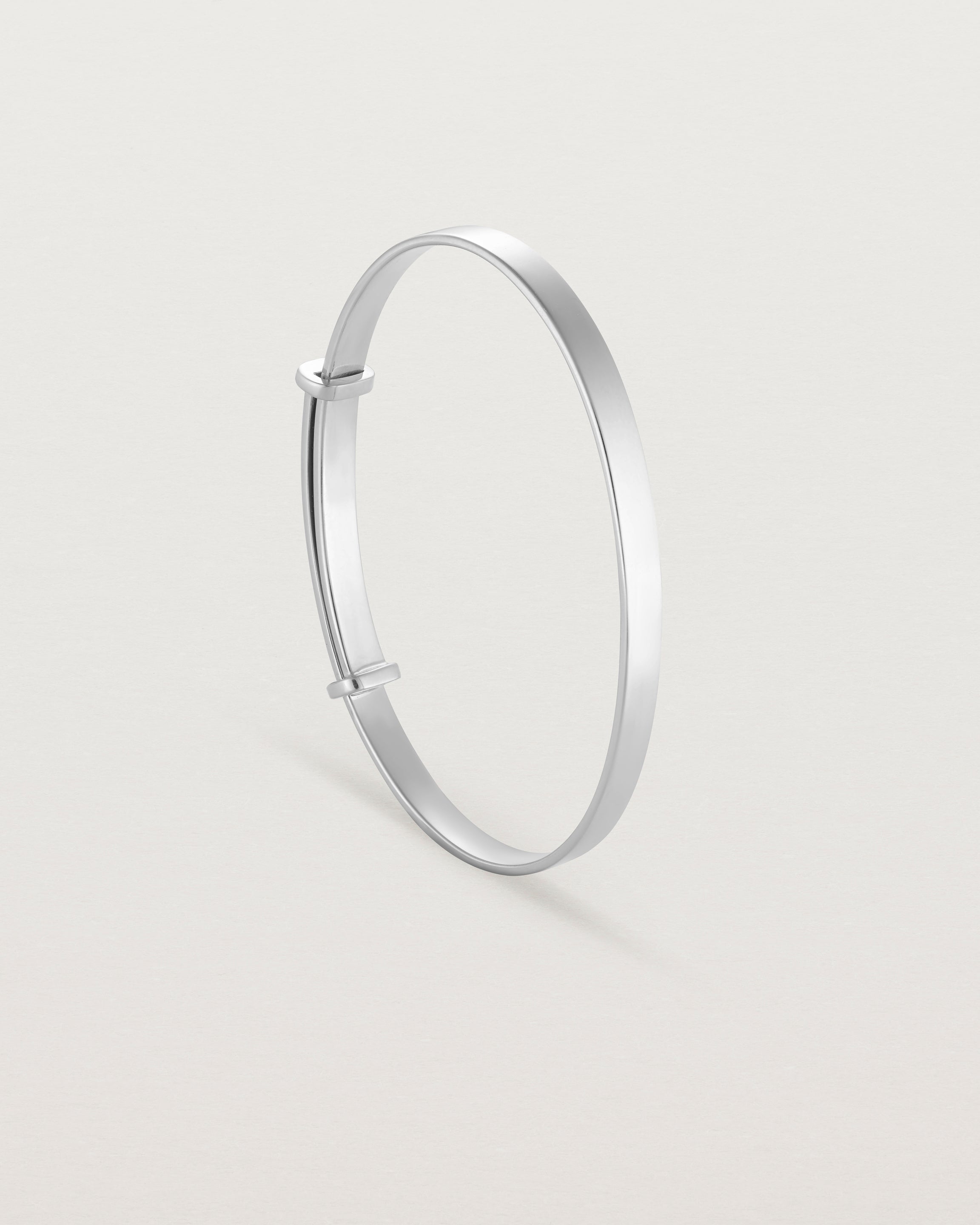 standing image of the Toujours Bangle in Sterling Silver