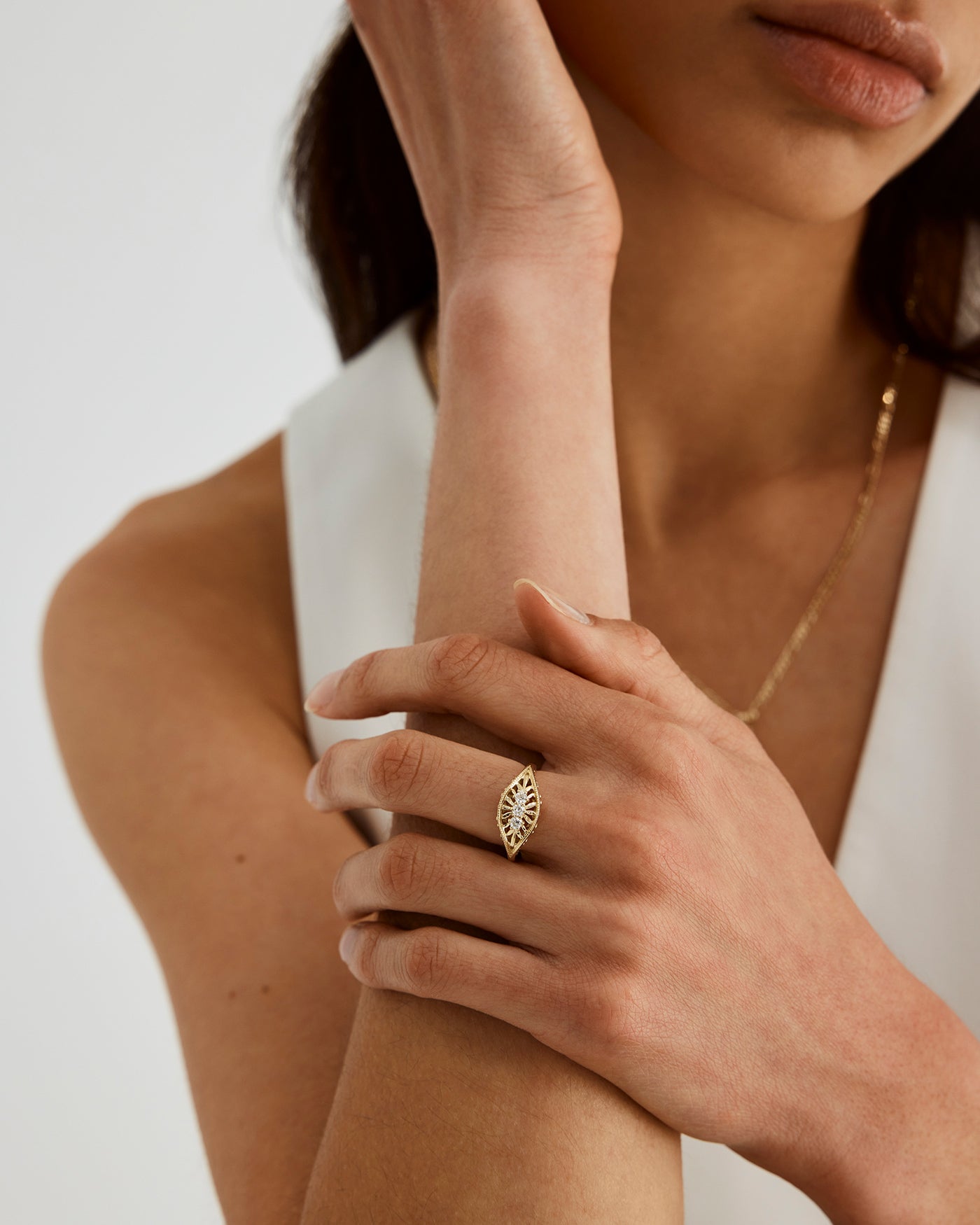 A woman wearing the Bonnie Shield Ring 