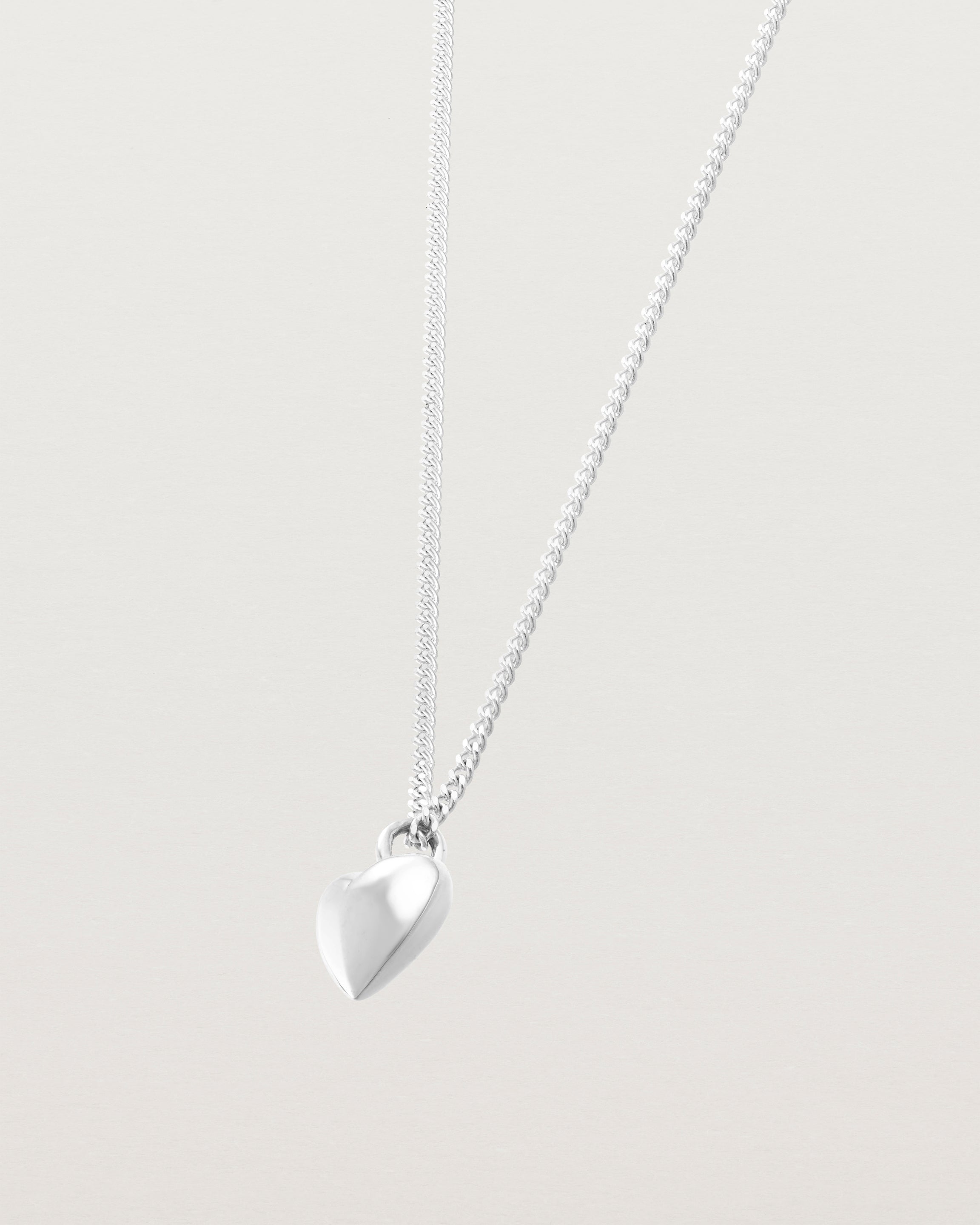 side image of the heart ella necklace in sterling silver.