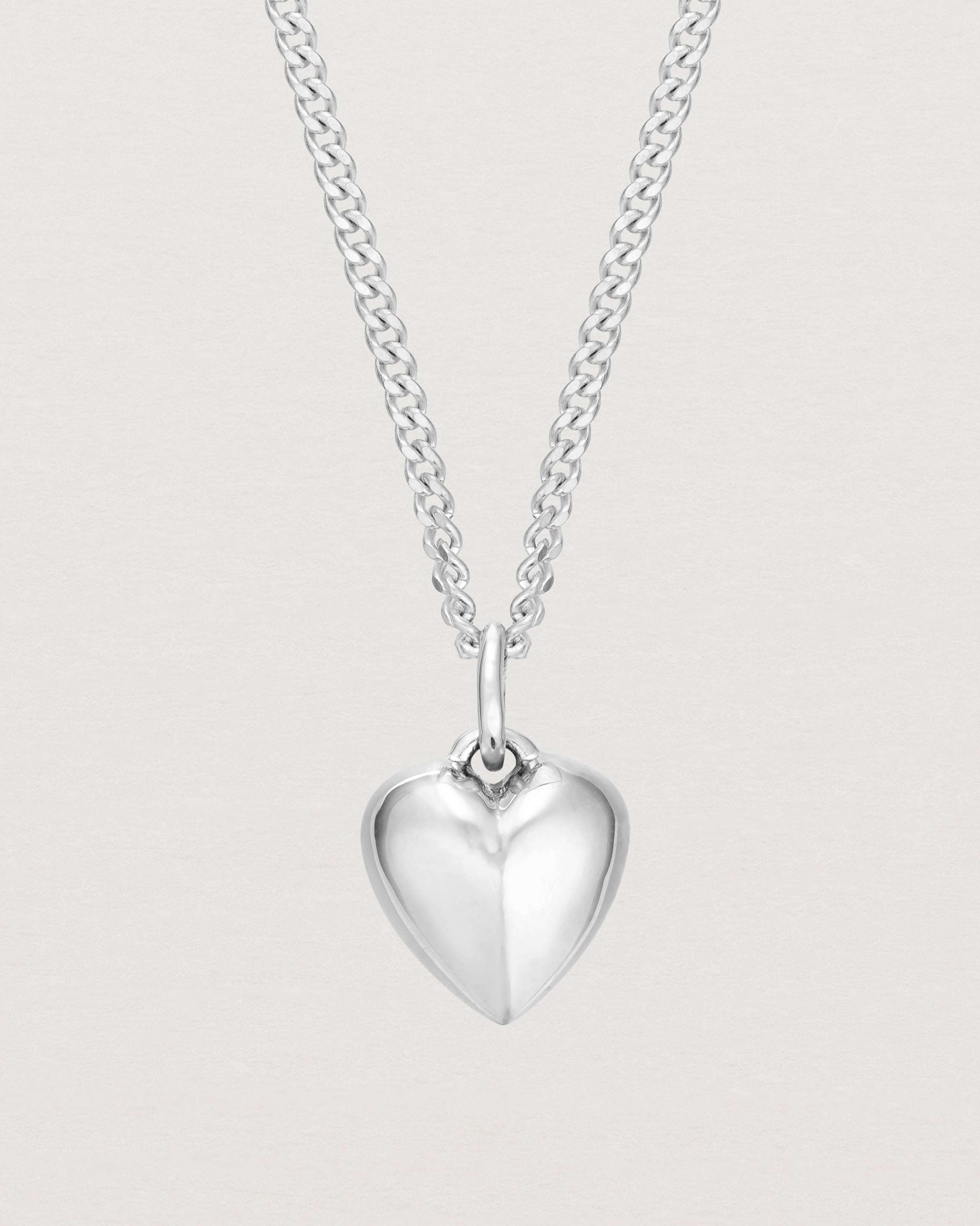 close up image of the heart ella necklace in sterling silver.