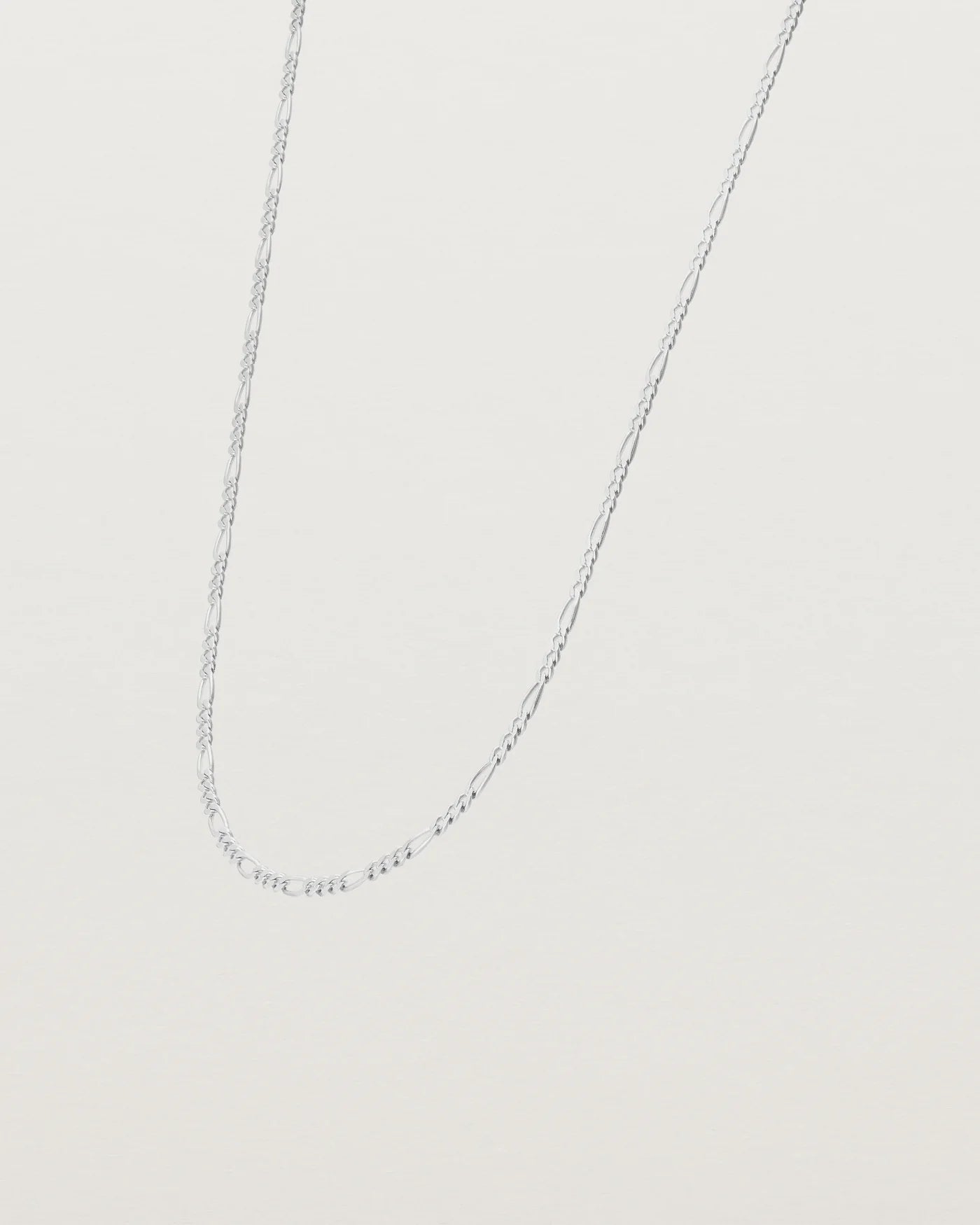 Side on image of the petits figaro necklace in sterling silver