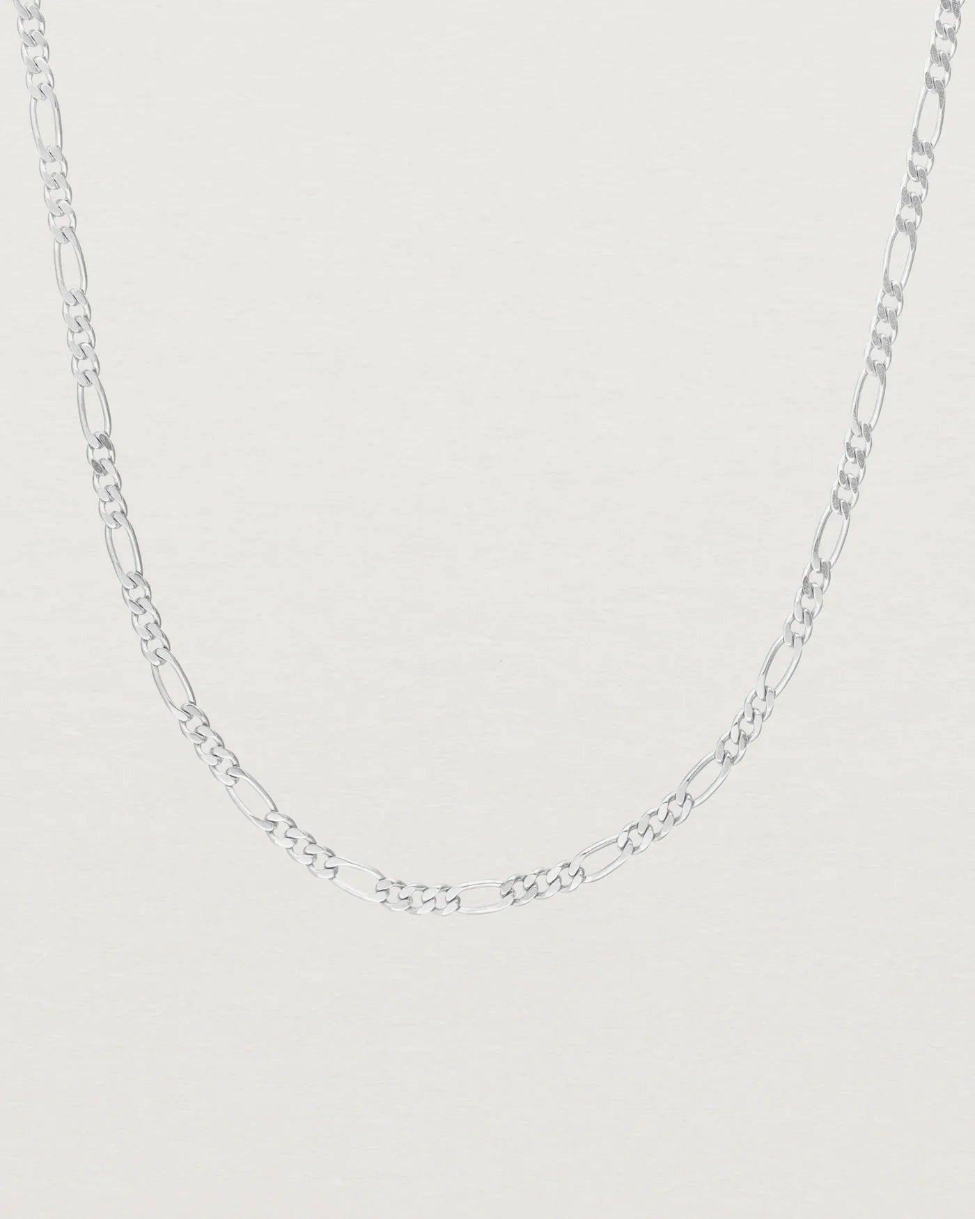 Close up image of the petits figaro necklace in sterling silver