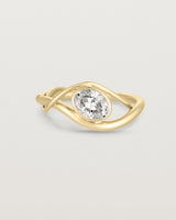 front on deep etched image of a yellow gold  engagement ring with a oval  diamond stone