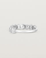 back facing deep etched image of a white gold wrap engagement ring with 11 white laboratory grown diamonds.