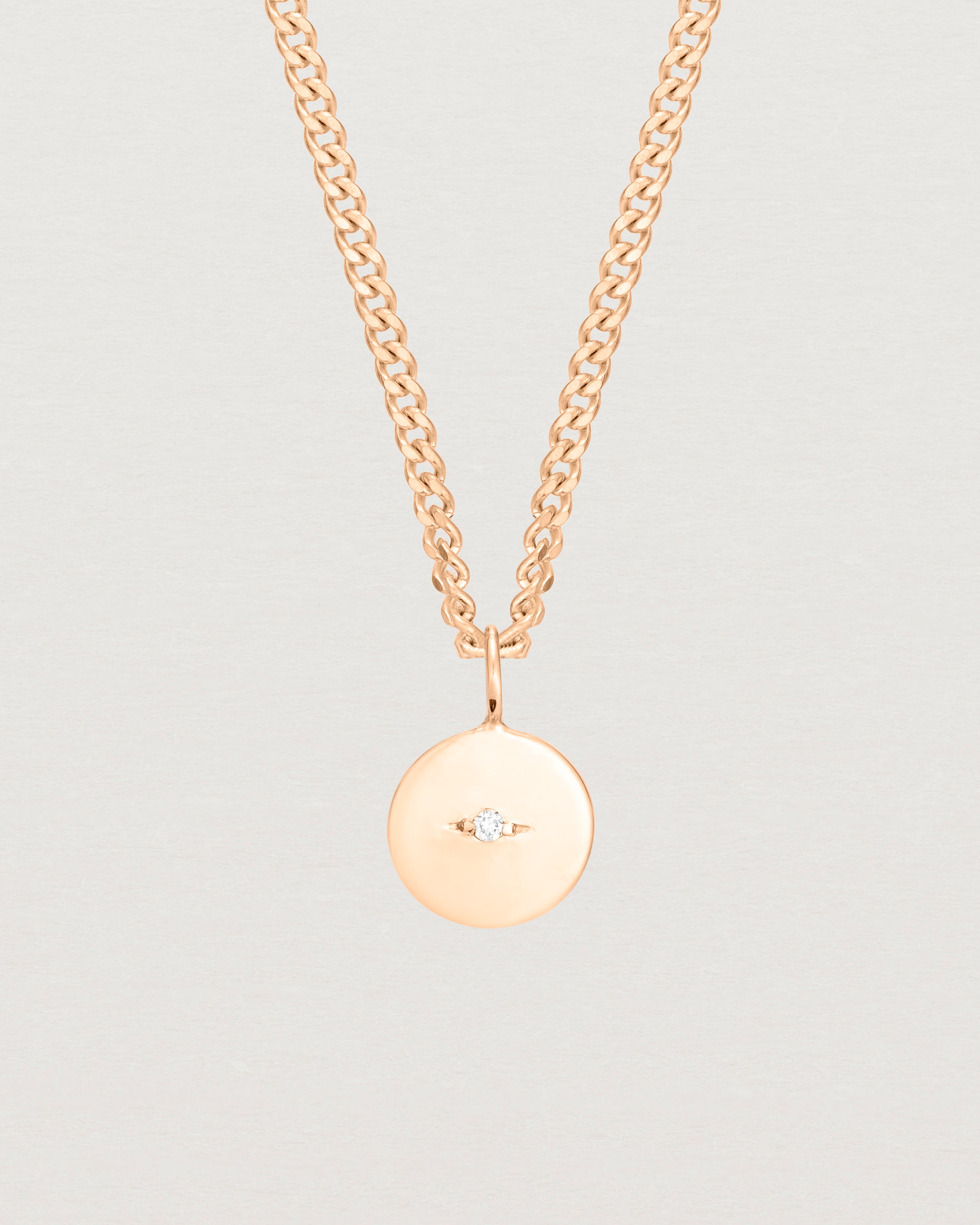 Close up image of the Petit Eily Necklace in rose gold.