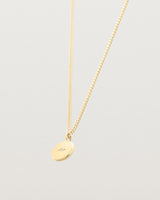 Side image of the Petits Eily necklace with diamond in yellow gold