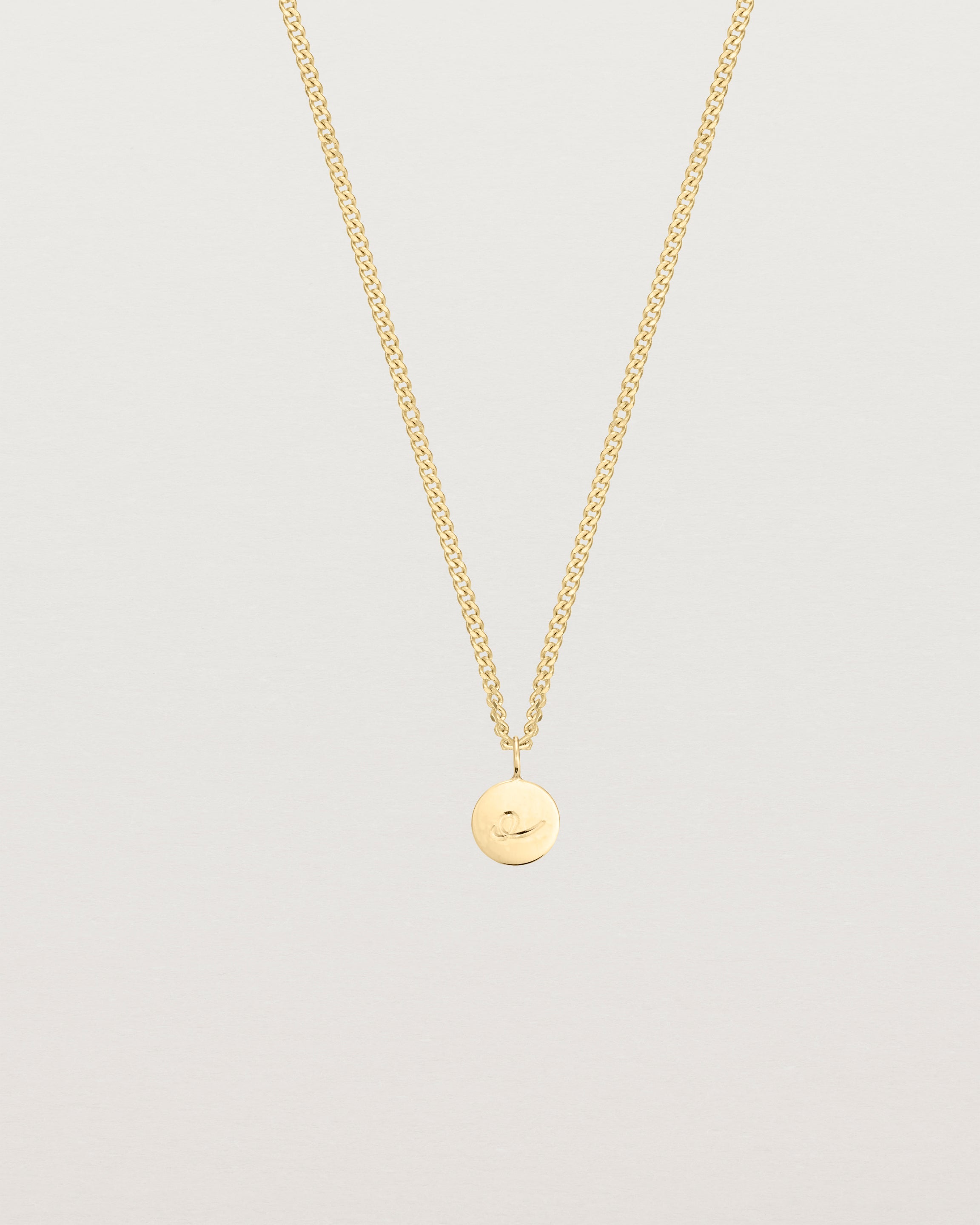 Front on image of the Petit Mae Pendant in yellow gold.