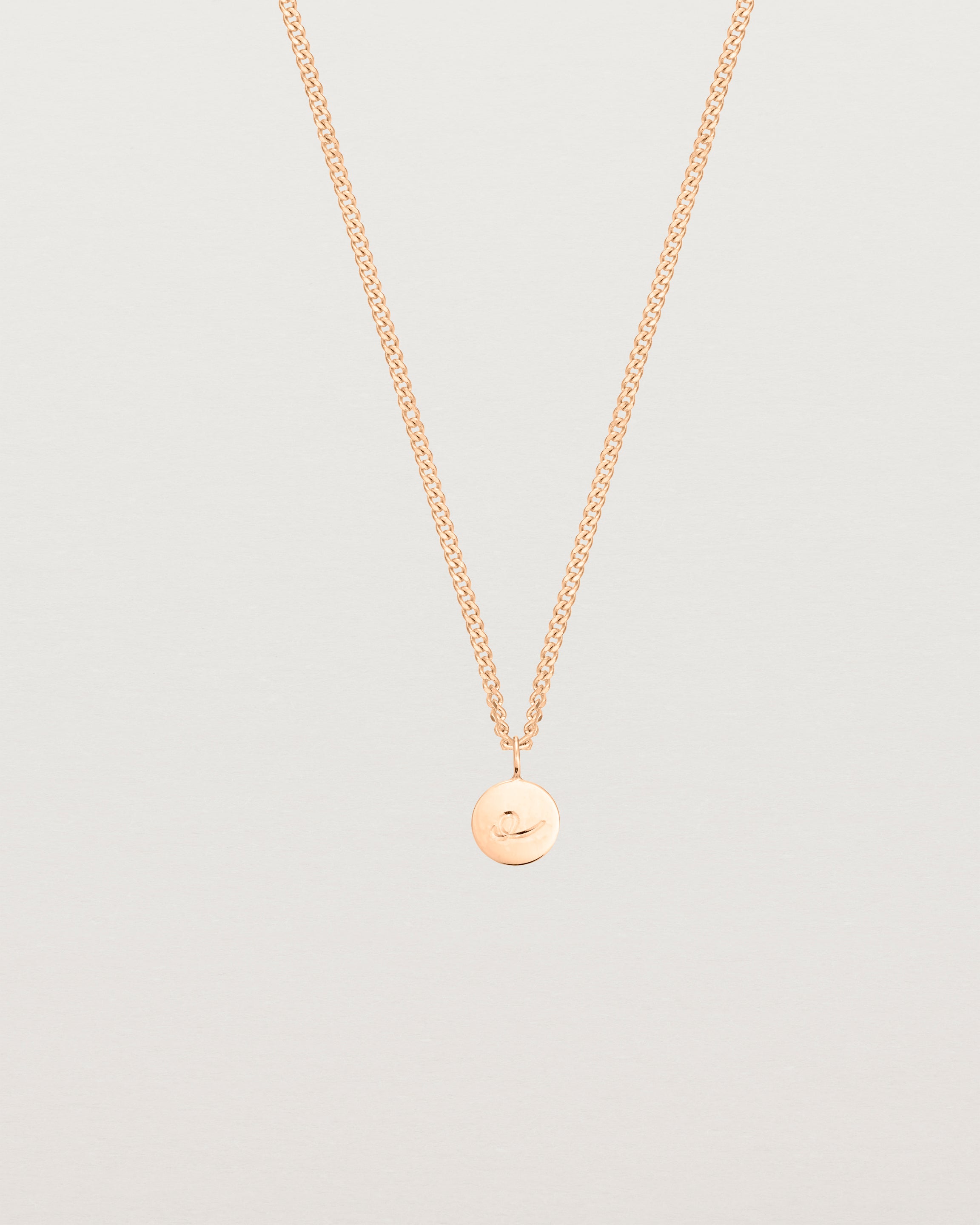 front on image of the petits mae pendant in rose gold