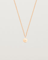 front on image of the petits mae pendant in rose gold