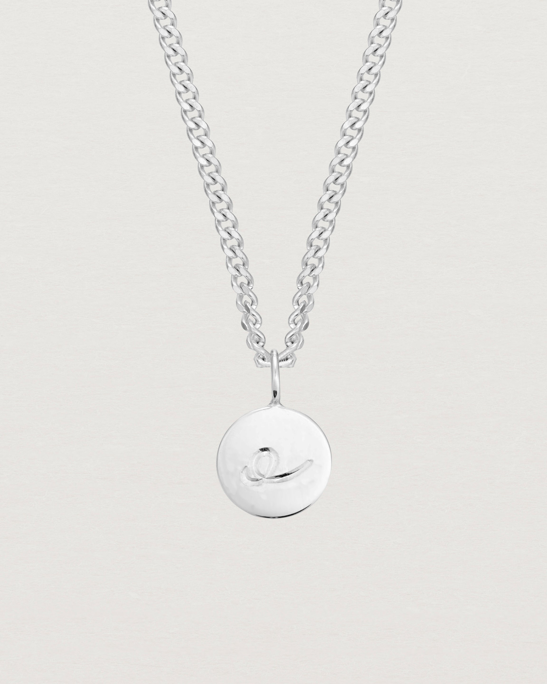 Close up image of the Petits Mae Necklace in Sterling Silver