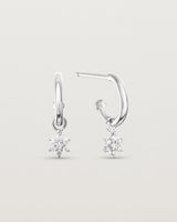 front on image of two petit starburst diamond hoops in white gold