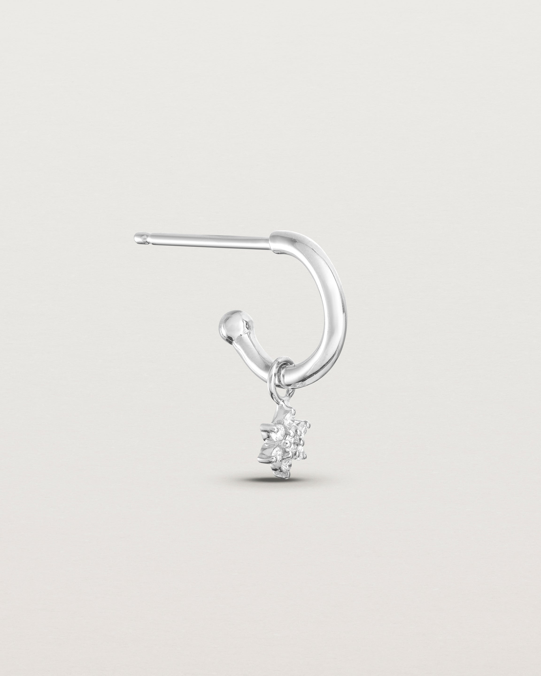 front on image of one petit starburst diamond hoops in white gold