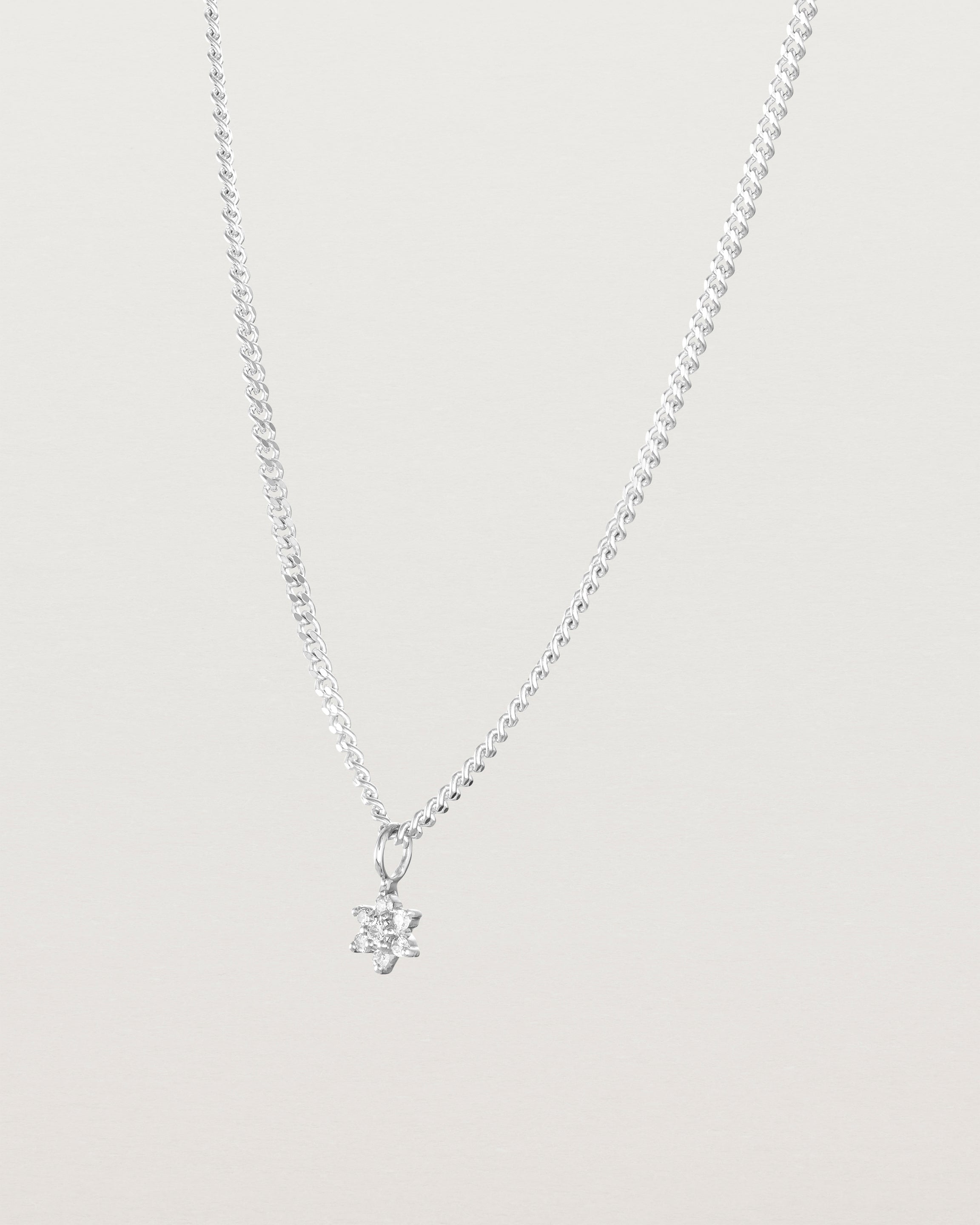 Side image of the Petit Starburst Necklace in White Gold