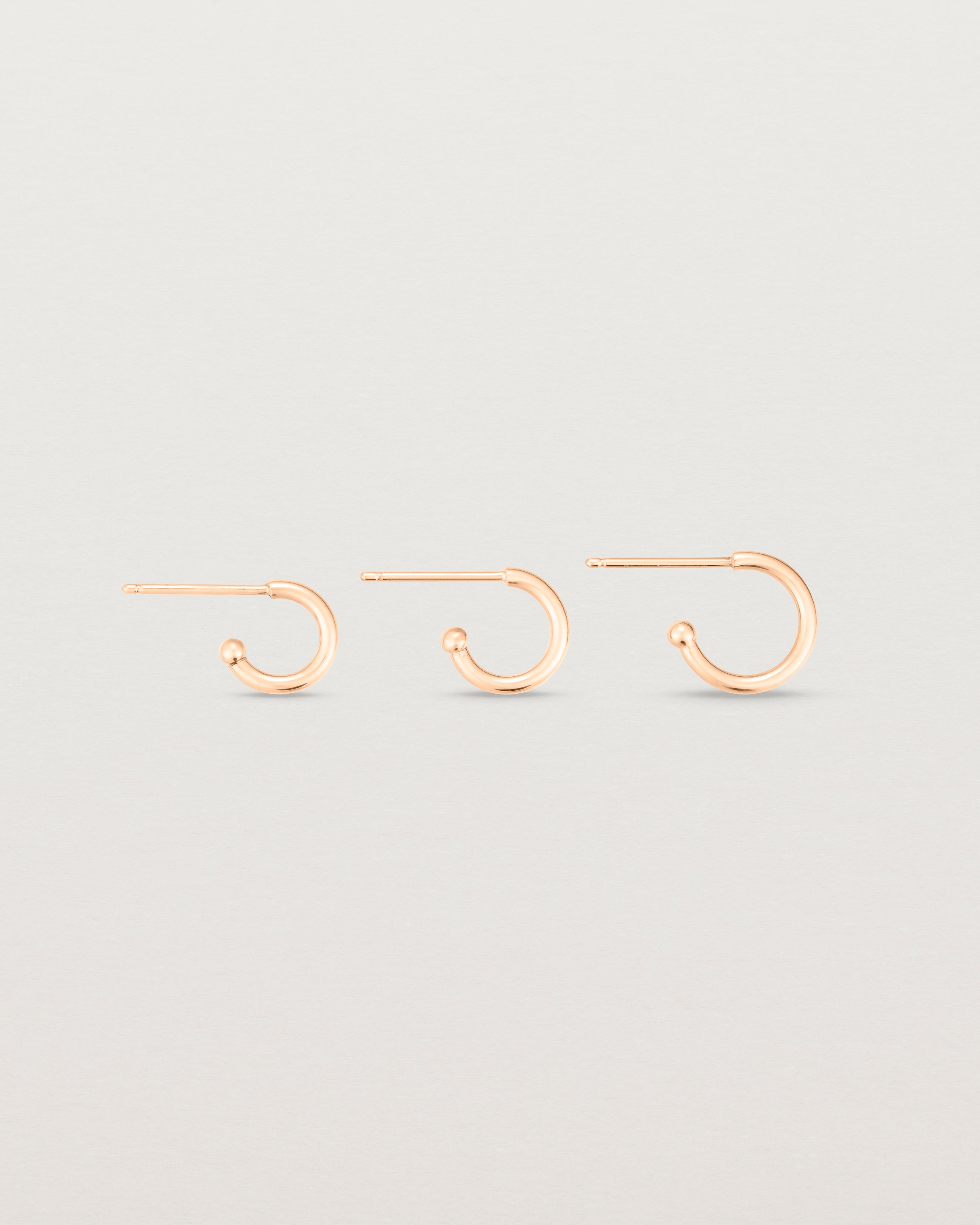 Image of the petits suspend hoops in rose gold across the three different sizes