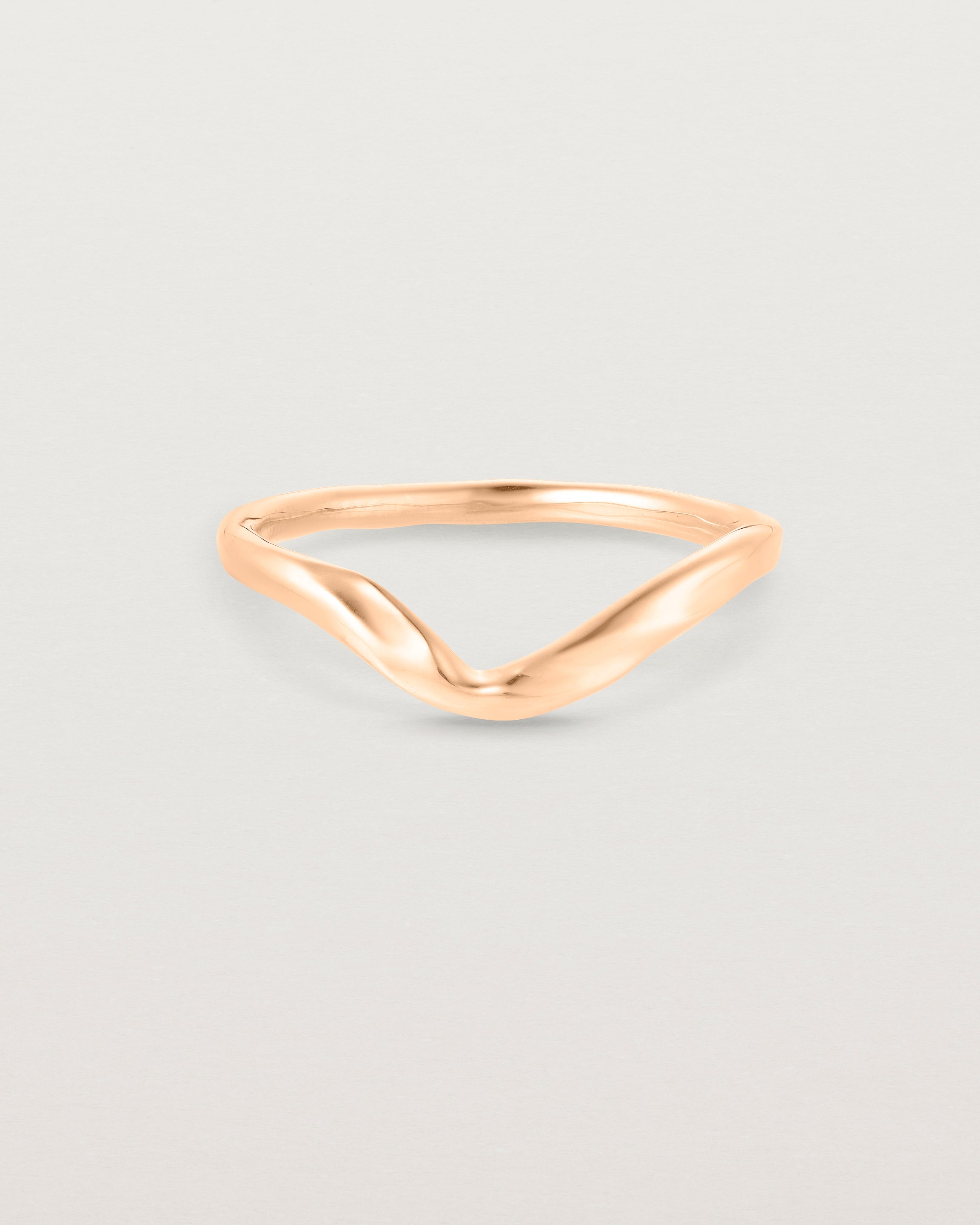 Front facing deep etched rose gold wedding band