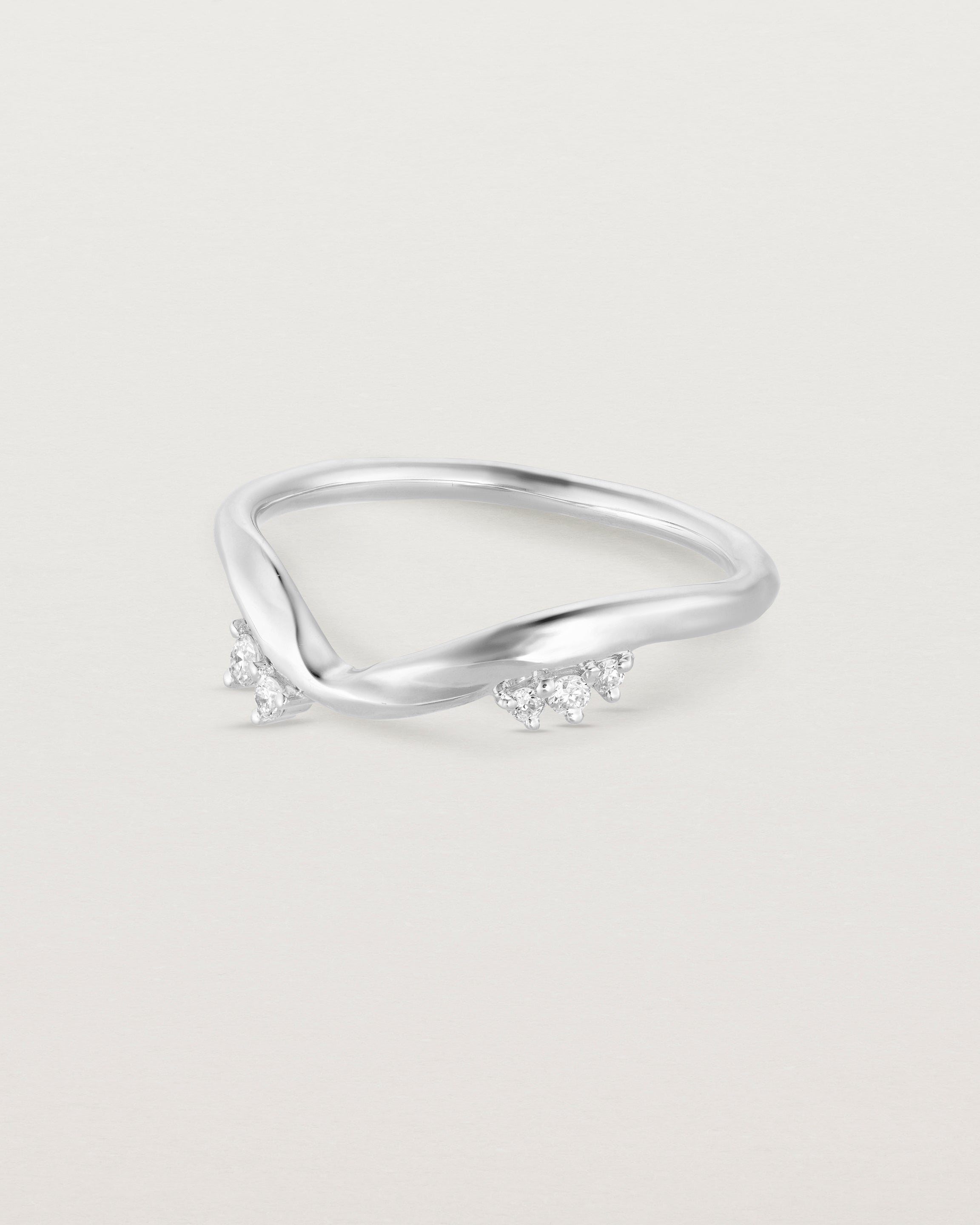 side facing deep etched image of a laboratory grown diamond wedding band