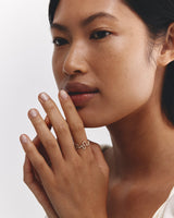 Model wears Rumi Diamond Ring in yellow gold.