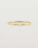 Fine yellow gold stacking ring featuring a white marquise centre diamond